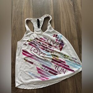 Women's White and Pink Graphic Tank Top workout shirt
Size medium